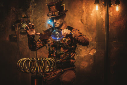 man in steampunk costume with coil