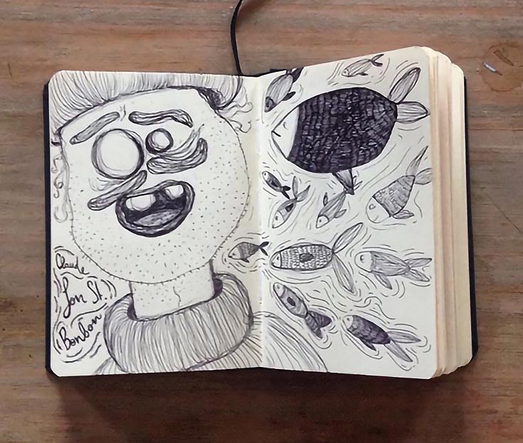 Moleskine sketching notebook filled with sketches