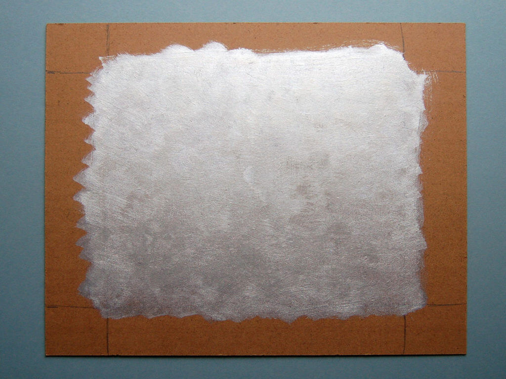 Silver paint covering a board