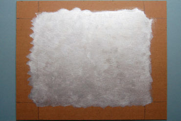 Silver paint covering a board