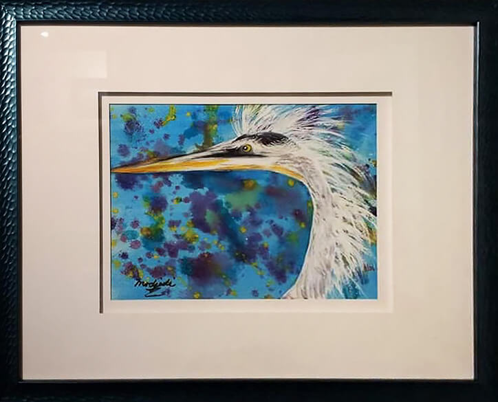 Framed watercolor painting of an egret head on a bright blue abstract background