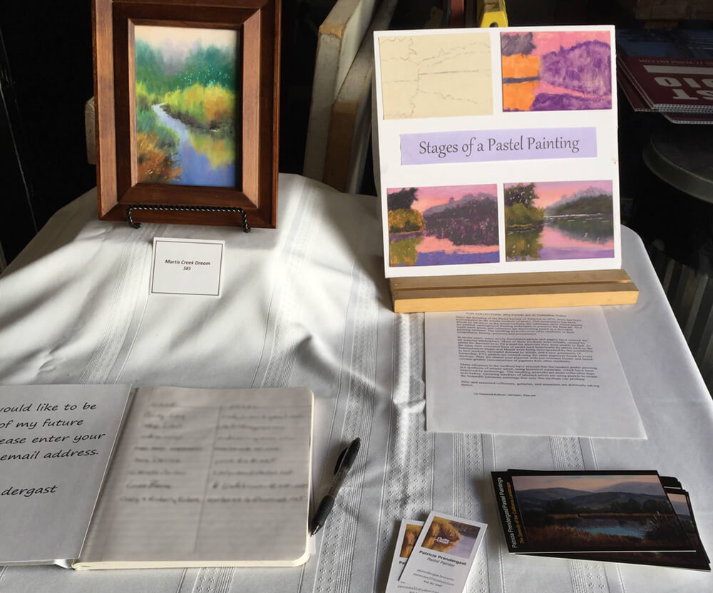 Display showing the artistic process creating a pastel painting
