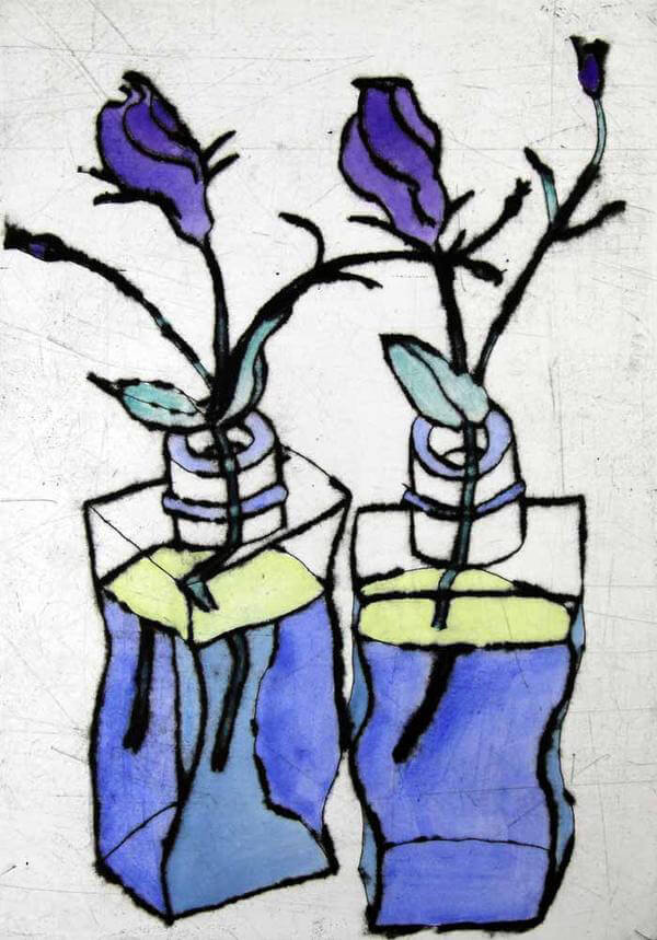 Purple flowers in glass vases