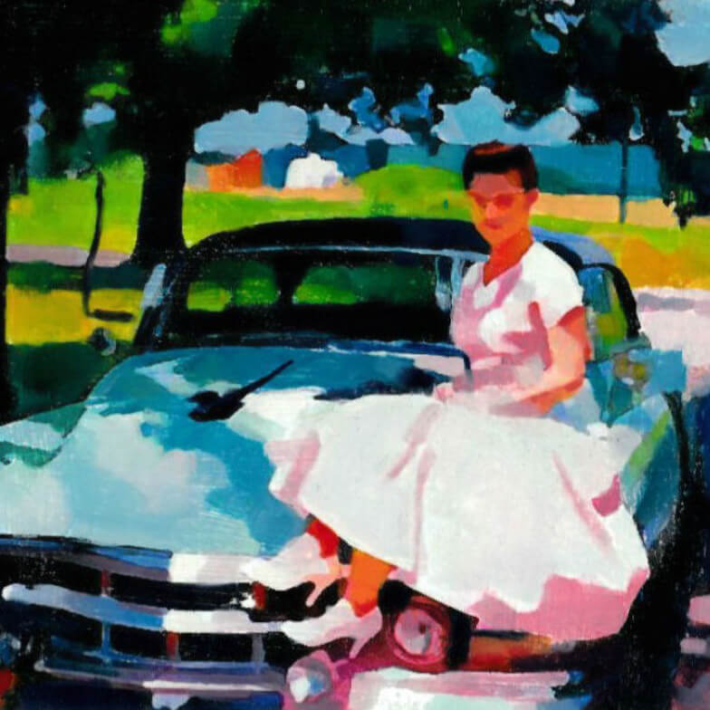 Woman in a pink dress seated on the hood of a classic car